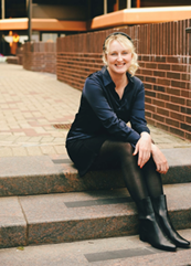 Woman sitting on steps
